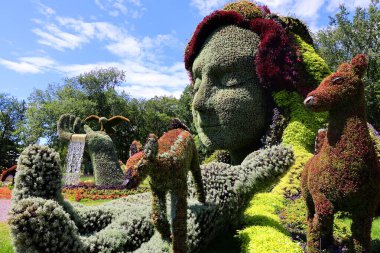 Mosaiculture 'daki kız heykeli Bir Zamanlar Dünyası' nda sergi, gezegenimizdeki yaşamın güzelliği için bir ilahi olacak.