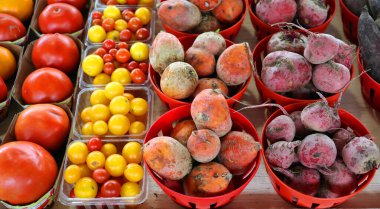 Various fruits and vegetables in baskets at the Jean-Talon Market is a farmer's market in Montreal. Located in the Little Italy district