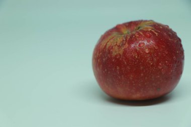 Red apple with drops isolated on white.Red apple isolated on white Clipping Path