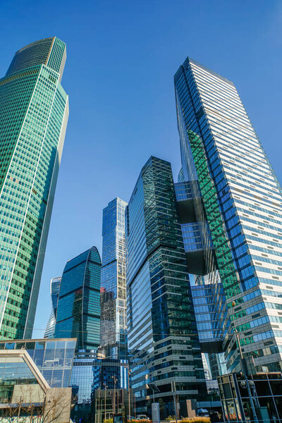 Skyscrapers in the business center, financial district, sunny day, blue sky, empty space, Moscow city, Russia. Can be used for websites, brochures, posters, printing and design.