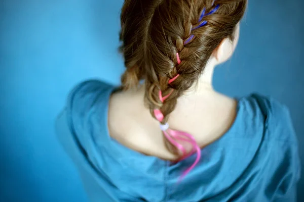 Generation Z girl hairstyle on blue background. Colorful hair — Stock Photo, Image