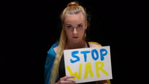 Serious Ukrainian Woman Showing Stop War Blue Yellow Banner Looking — Wideo stockowe