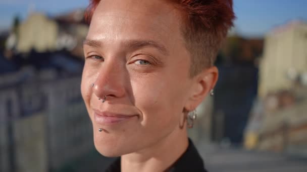 Headshot Positive Pierced Adult Woman Looking Camera Smiling Sunshine Close — Stockvideo