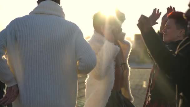 Medium Shot Joyful Friends Dancing Sunrays Urban Roof Sunset Happy — Stockvideo