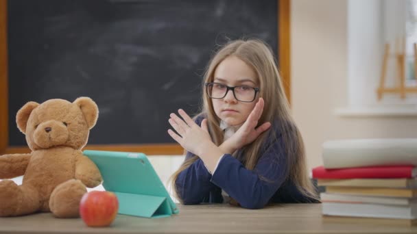 Exhausted Caucasian Girl Gesturing Crossing Hands Looking Camera Sitting School — Vídeos de Stock