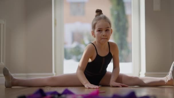 Wide Shot Teenage Girl Sitting Twine Bending Forward Slow Motion — Stockvideo