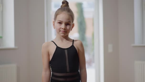 Medium Shot Portrait Confident Teen Gymnast Looking Camera Standing Indoors — Stockvideo