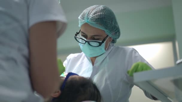 Portrait Focused Professional Caucasian Female Dentist Working Hospital Indoors Patient — Vídeo de Stock