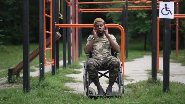 Wide Shot Portrait Positive Brave Soldier Wheelchair Listening Music Headphones — Stok Video