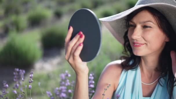 Adult Beautiful Woman Admiring Reflection Hand Mirror Sitting Lavender Field — Stok video
