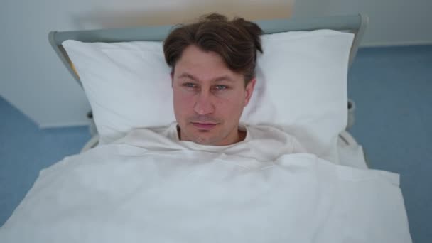 High Angle View Portrait Fatigue Caucasian Ill Man Lying Bed — стоковое видео