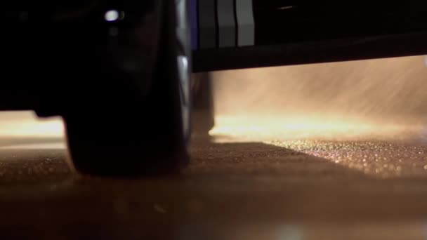 Close Car Wheel Door Darkness Water Spraying Background Female Feet — Stockvideo