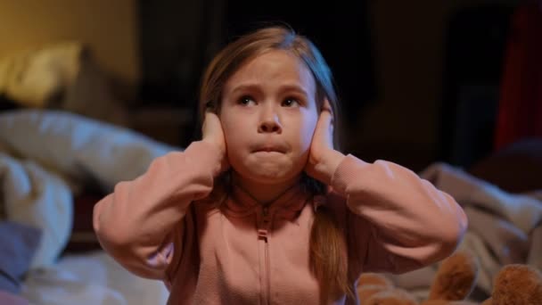 Scared Stressed Anxious Ukrainian Girl Covering Ears Hands Listening Bombardment — Stockvideo