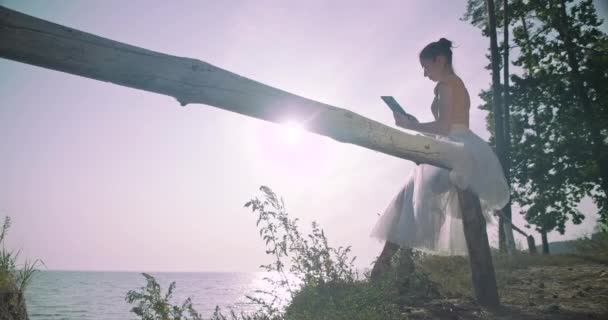Slim Happy Caucasian Ballerina Sitting Right Digital Tablet Sunrays Young — ストック動画