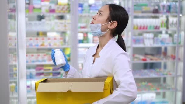 Overworking Ill Asian Woman Putting Pills Shelves Drugstore Coughing Side — Videoclip de stoc