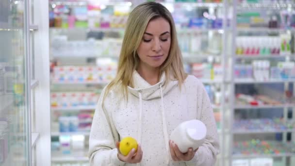 Thoughtful Unsure Pregnant Woman Choosing Pills Fruit Making Decision Looking — Video