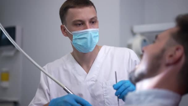 Portrait Expert Dentist Using Dental Drill Patient Sitting Dental Chair — Stock video