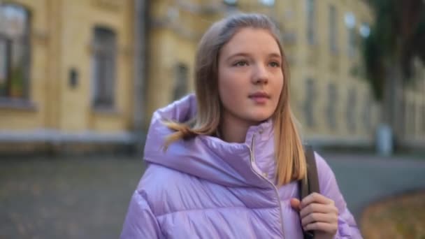 Portrait Charming Teenage Schoolgirl Hanging Backpack Shoulder Walking Autumn Schoolyard — Stockvideo
