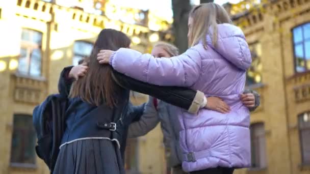 Group Cheerful Teen Classmates Standing Circle Talking Hugging Laughing Schoolyard — Stock Video