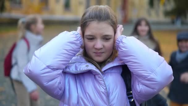 Stressed Ashamed Sad Girl Covering Ears Hands Looking Camera Blurred — Stockvideo