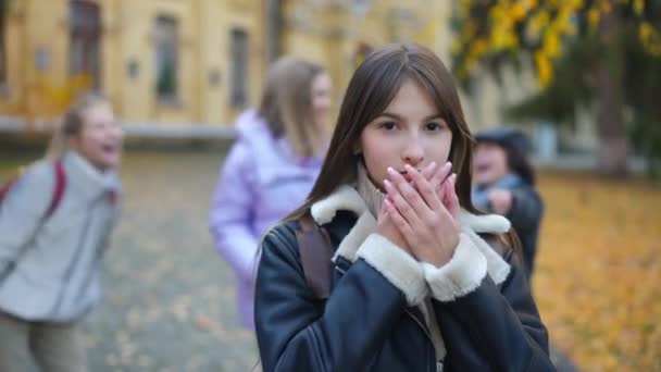 Ashamed Bullied Caucasian Teen Girl Covering Mouth Hands Looking Camera — Stok video