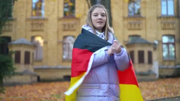 Live Camera Zoom Confident Teen Girl Wrapping German Flag Looking — Vídeo de Stock