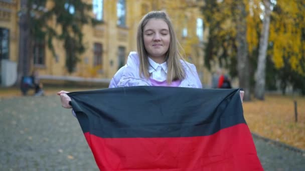 Portrait Teenage Girl German Flag Closed Eyes Making Wish Standing — 图库视频影像