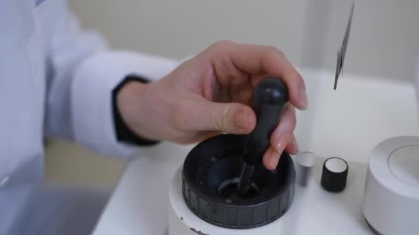 Close Female Hand Moving Slit Lamp Joystick Doing Medical Examination — Stockvideo
