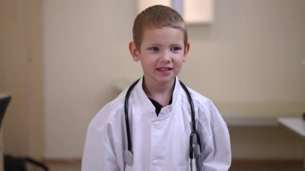 Cute Little Boy Medical Uniform Looking Camera Looking Standing Hospital — Stock video