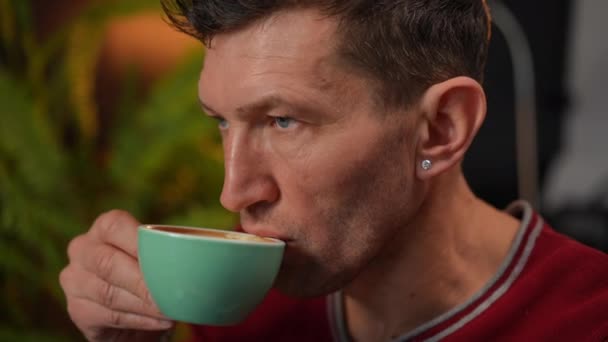 Headshot Confident Handsome Man Drinking Coffee Looking Away Thinking Serious — Stockvideo