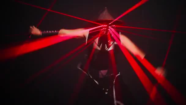 Professional Male Performer Spinning Dancing Samurai Costume Red Laser Beam — Stock video