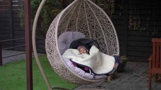 Calm Cute Baby Girl Sleeping Hanging Chair Patio Backyard Outdoors — Vídeo de stock