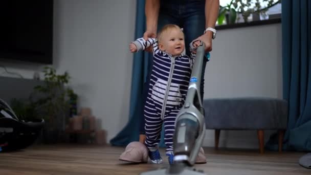 Cute Cheerful Infant Girl Walking Helping Woman Vacuuming Floor Vacuum — ストック動画