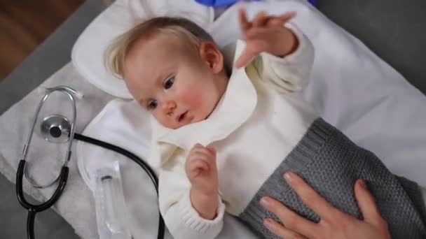 Top View Portrait Curios Carefree Baby Girl Lying Hospital Stethoscope — Vídeo de stock