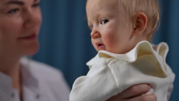 Close Cute Caucasian Baby Girl Hands Positive Blurred Woman Medical — Video Stock