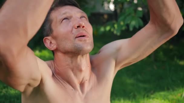 Close Shirtless Male Yogi Doing Breathing Exercise Meditating Closing Eyes — Stock Video