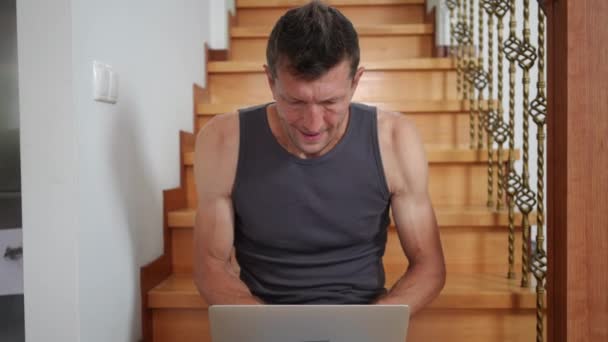 Portrait Angry Dissatisfied Caucasian Adult Man Sitting Stairs Messaging Online — Stock Video