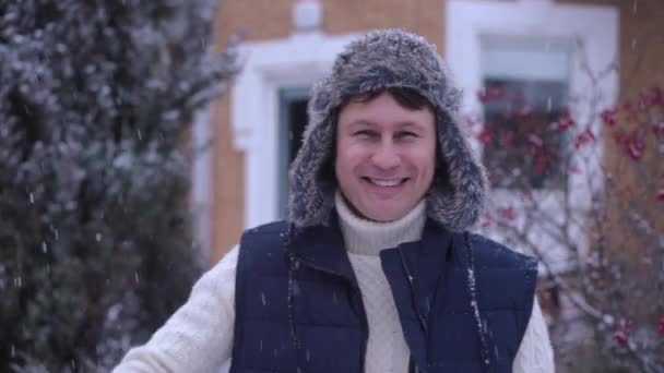 Joyful Happy Caucasian Man Fur Hat Posing Slow Motion Snowy — Stock Video