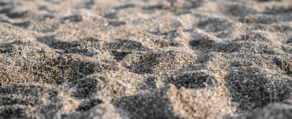 부드러운 초점을 가진 모래사장의 배경 질감 — 스톡 사진