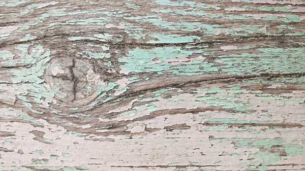 Çatlak renkli pastel boyalı eski ahşap doku. Üst görünüm