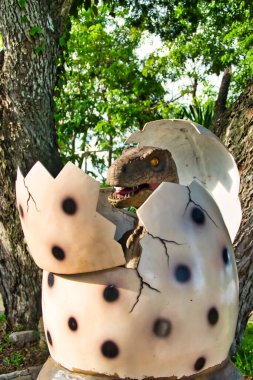 Dinosaur egg of Tyrannosaurus rex along the boulevard of the Mekong River, Chiang Khan, province of Loei, Thailand 
