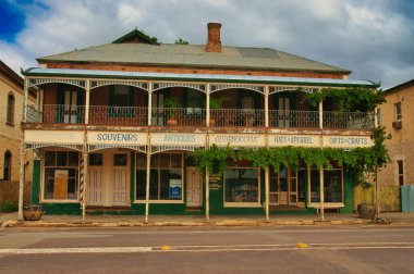 Typically Australian Victorian building with small shops and a roofed balcony on the second floor in the town of Quorn, South Australia