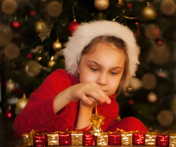 Girl Holding Christmas Bell Her Hands Christmas Gifts Royalty Free Stock Photos