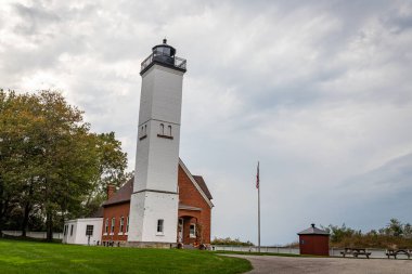 The Presque Isle Lighthouse signals the shoreline of Presque Isle State Park on Lake Erie at Erie, Pennsylvania.