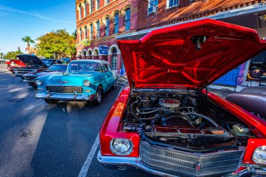 Fernandina Beach, FL - October 18, 2014: Wide angle view of vintage street rods at a classic car show in Fernandina Beach, Florida.