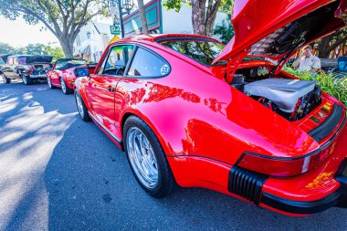 Fernandina Beach, FL - October 18, 2014: Wide angle low perspective rear corner view of a 1986 Porsche 930 Turbo coupe at a classic car show in Fernandina Beach, Florida.