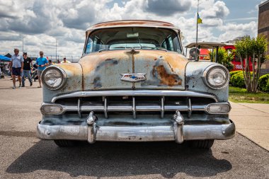 Lebanon, TN - May 14, 2022: Low perspective front view of a 1954 Chevrolet 210 Handyman Station Wagon at a local car show.
