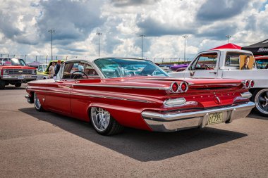 Lebanon, TN - May 14, 2022: Low perspective rear corner view of a 1960 Pontiac Parisienne Hardtop Coupe at a local car show.