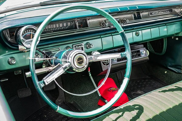 Lebanon, TN - May 14, 2022: High angle front interior view of a 1961 Pontiac Catalina Safari Station Wagon at a local car show.