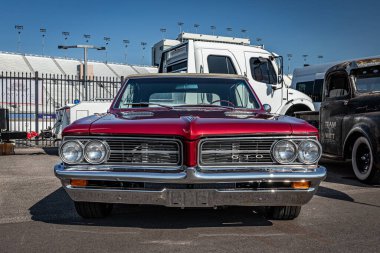 Lebanon, TN - May 13, 2022: Low perspective front view of a 1964 Pontiac GTO Convertible at a local car show.